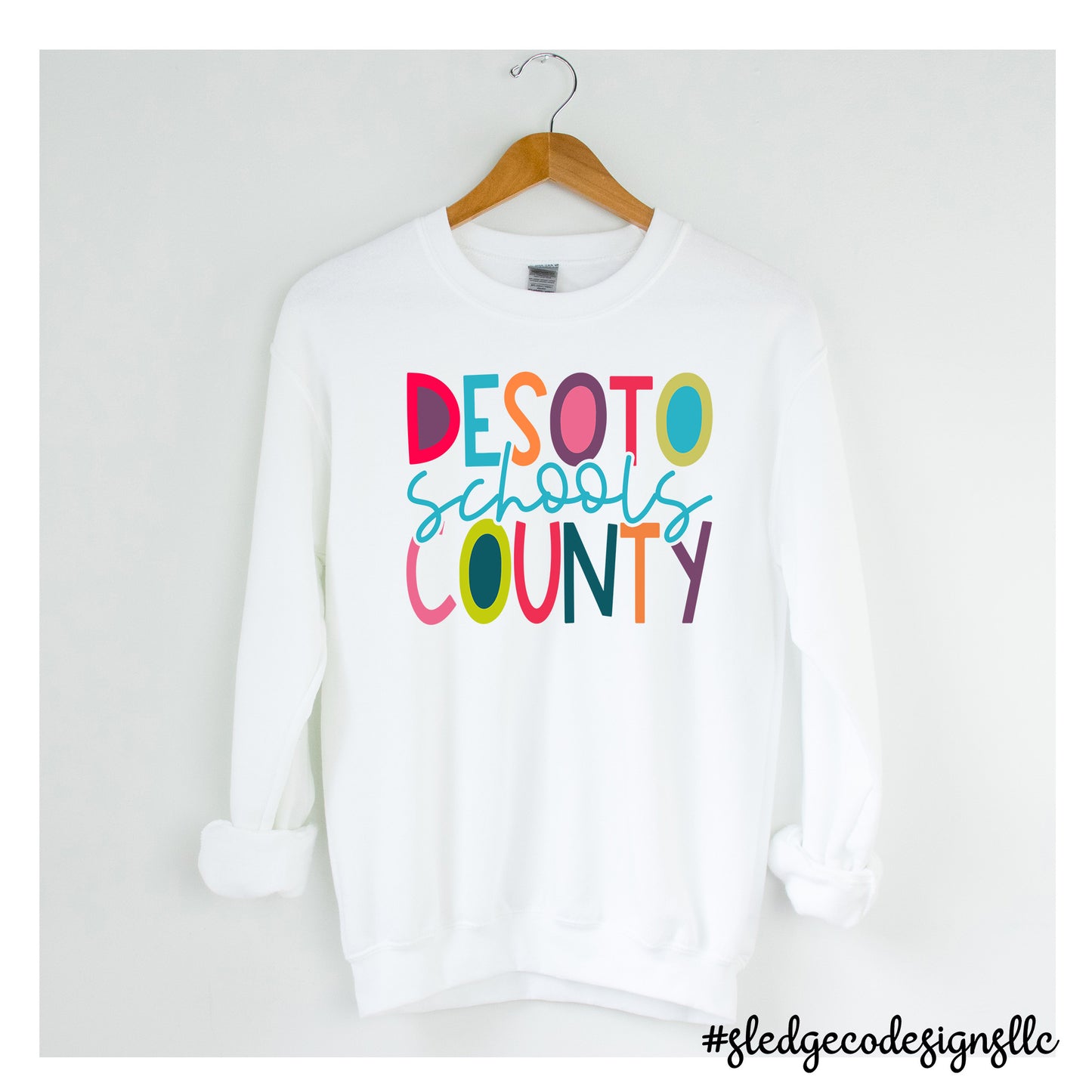 Desoto County Schools COLORFUL STACKED  | CUSTOM UNISEX SWEATSHIRT