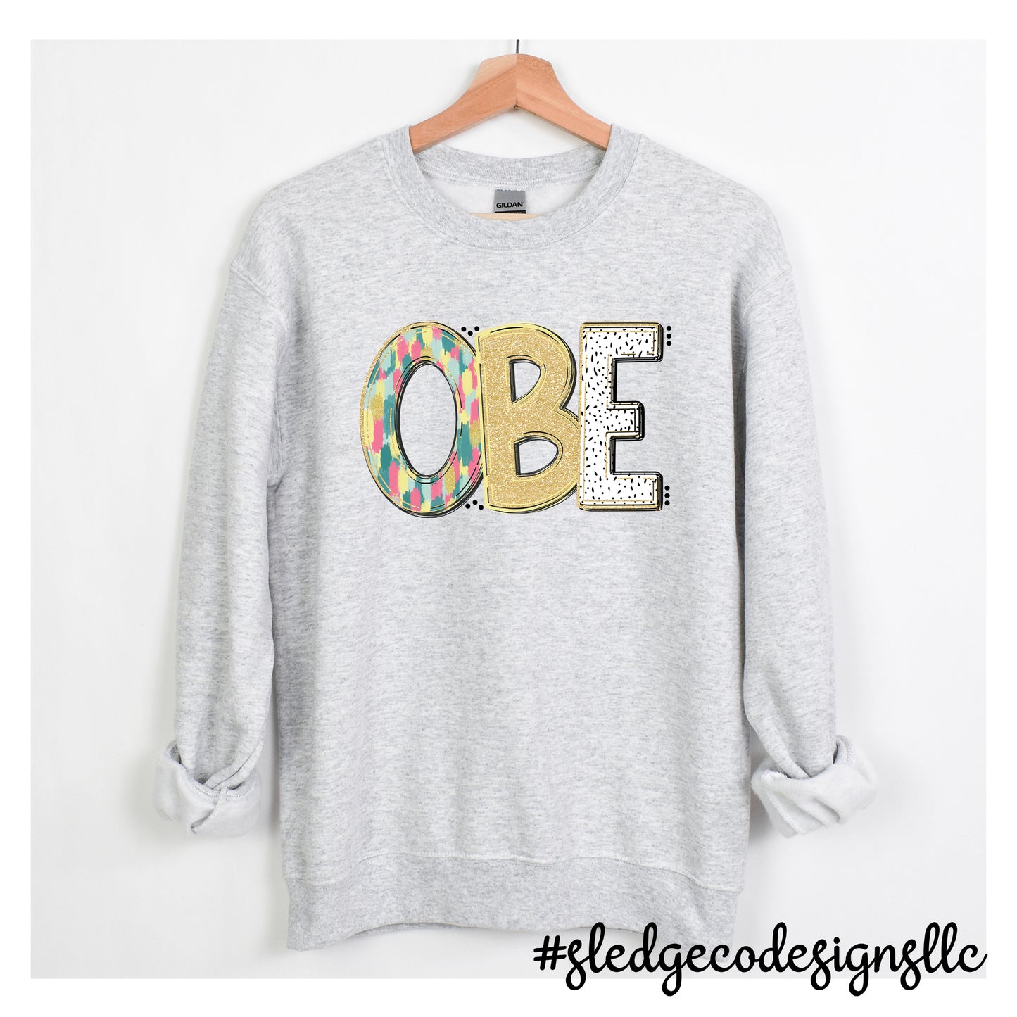 OLIVE BRANCH ELEMENTARY SCHOOL | OBE | HAND DRAWN SPRING DOODLE | CUSTOM UNISEX SWEATSHIRT