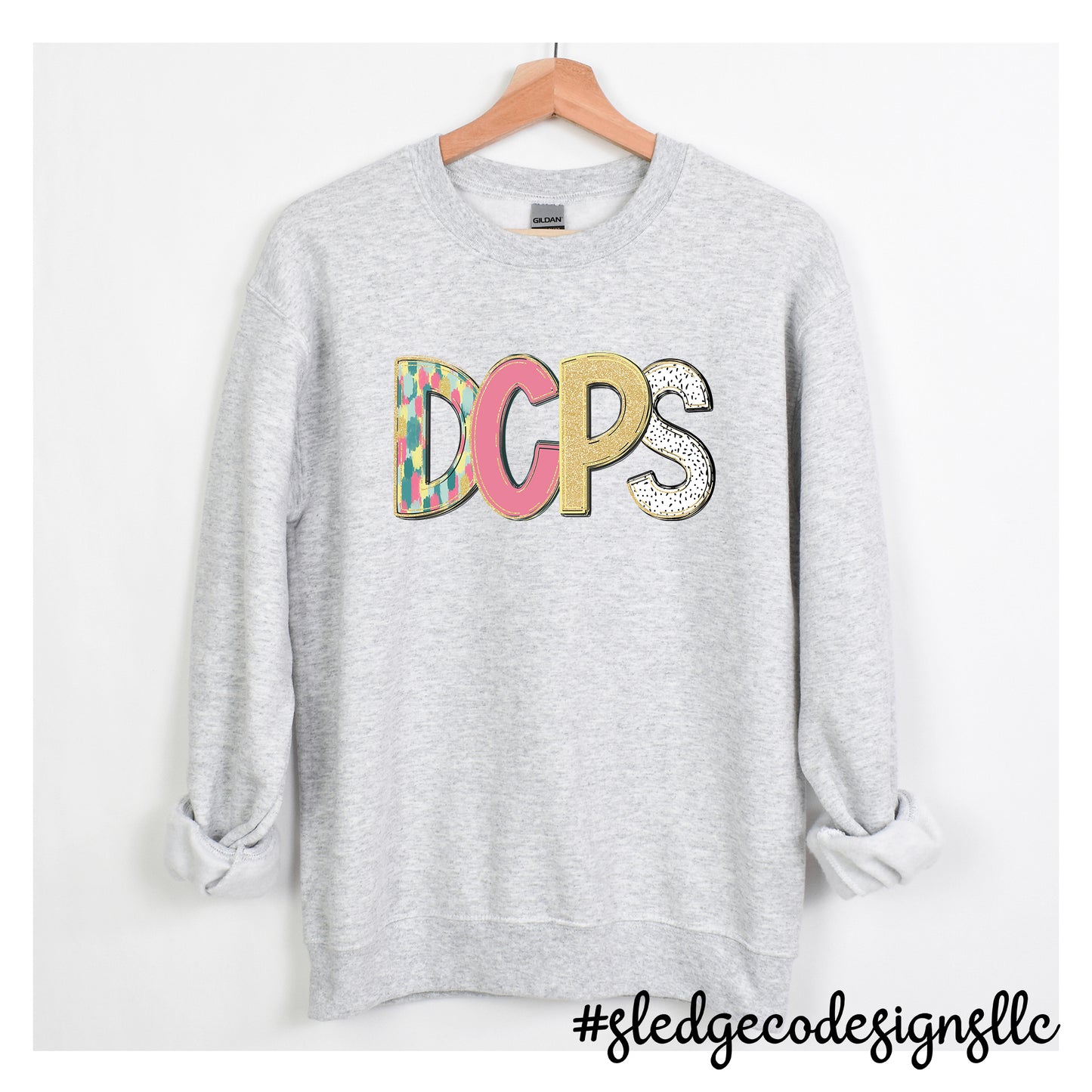 DESOTO CENTRAL PRIMARY SCHOOL | DCPS | HAND DRAWN SPRING DOODLE | CUSTOM UNISEX SWEATSHIRT