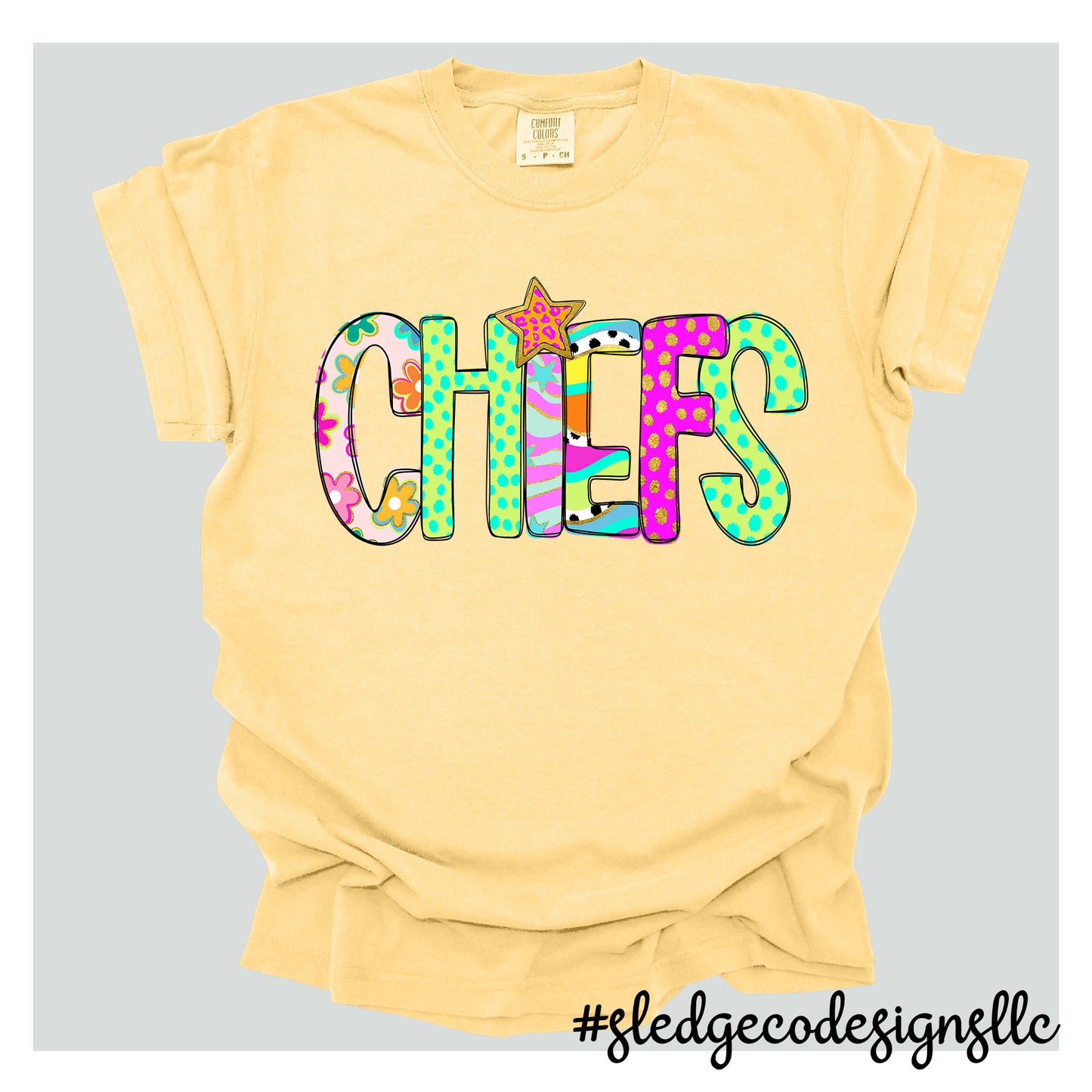 Yellow t-shirt with colorful 'CHEFS' text design on a gray background